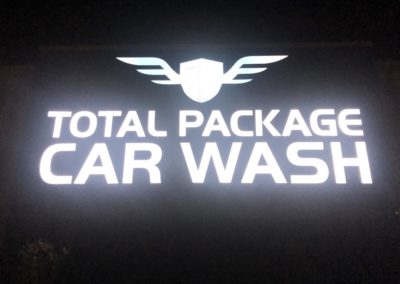 sign lit up at night